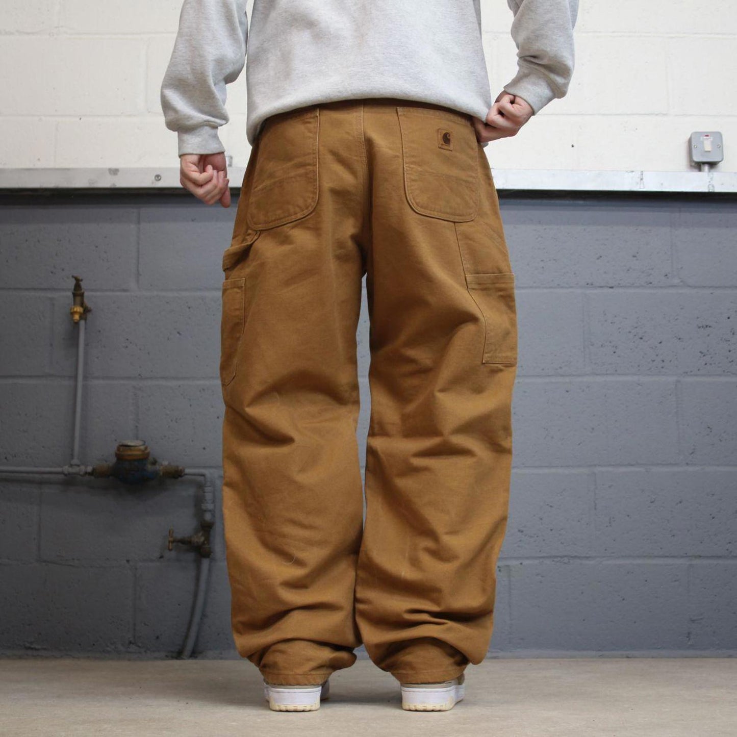 Vintage baggy Carhartt carpenter jeans tan 90s skater style W34L32 flannel lined carpenters