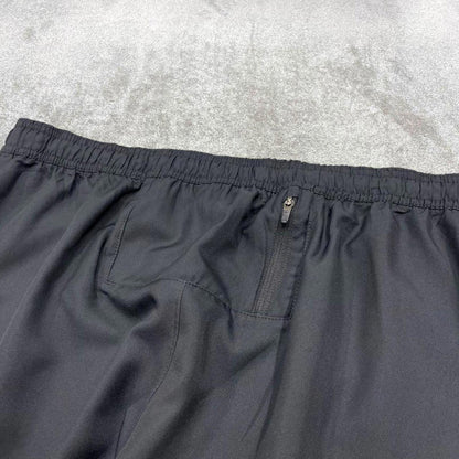 Vintage y2k Nike tracksuit bottoms black Floaty swoosh logo running track pants