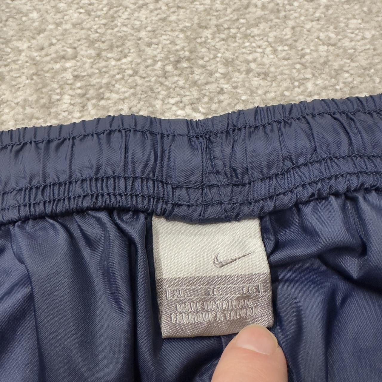 Vintage Nike tracksuit bottoms Y2K navy Loose leg unlined embroidered swoosh track pants
