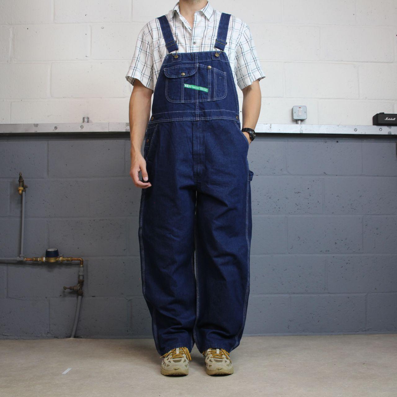 Vintage baggy denim dungarees 00s key overalls blue Patch logo and adjustable straps