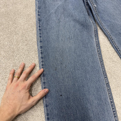 Levi’s 550 jeans Y2K blue relaxed denim Levi’s loose leg 2000s style pants red tab logo