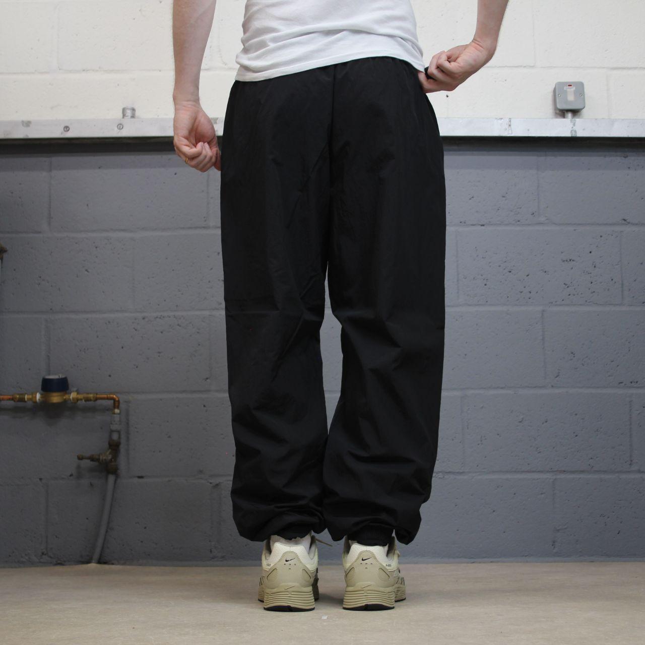 Nike Y2K tracksuit bottoms black Loose floaty mesh lined swoosh logo track pants