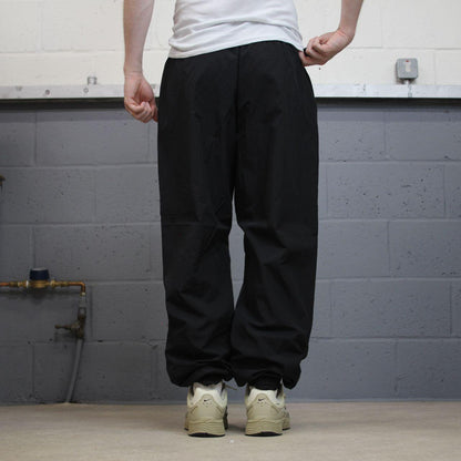 Nike Y2K tracksuit bottoms black Loose floaty mesh lined swoosh logo track pants