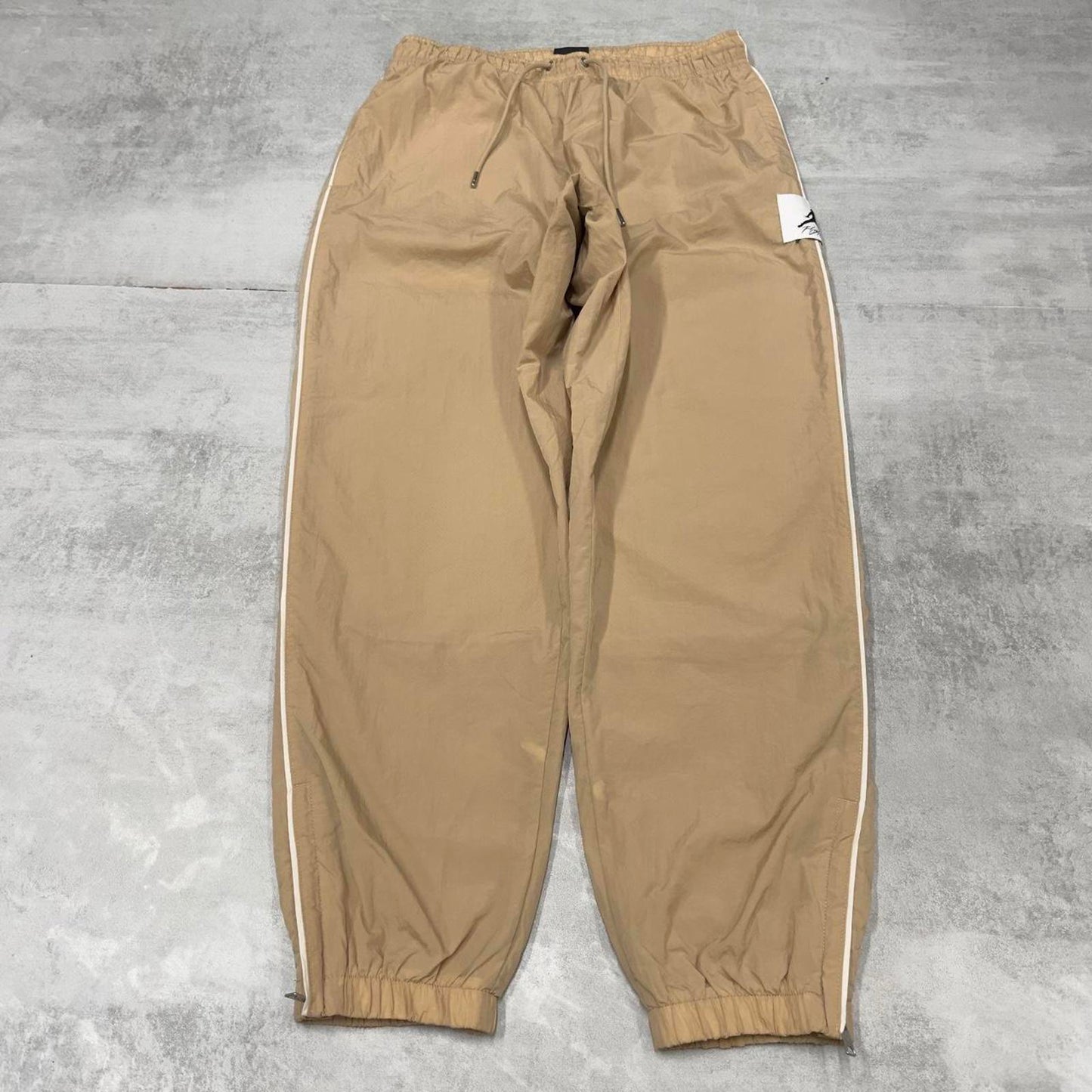 Air Jordan Trackies Large beige mesh lined loose sportswear floaty leg joggers