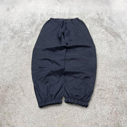 Vintage y2k Puma tracksuit bottoms navy Loose embroidered track pants ankle zips