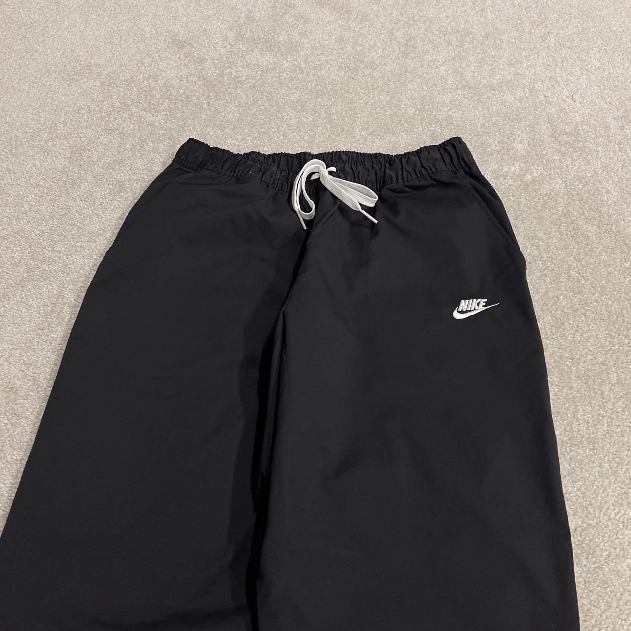 Y2K Nike technical tracksuit bottoms black Ulined track pants with embroidered logo