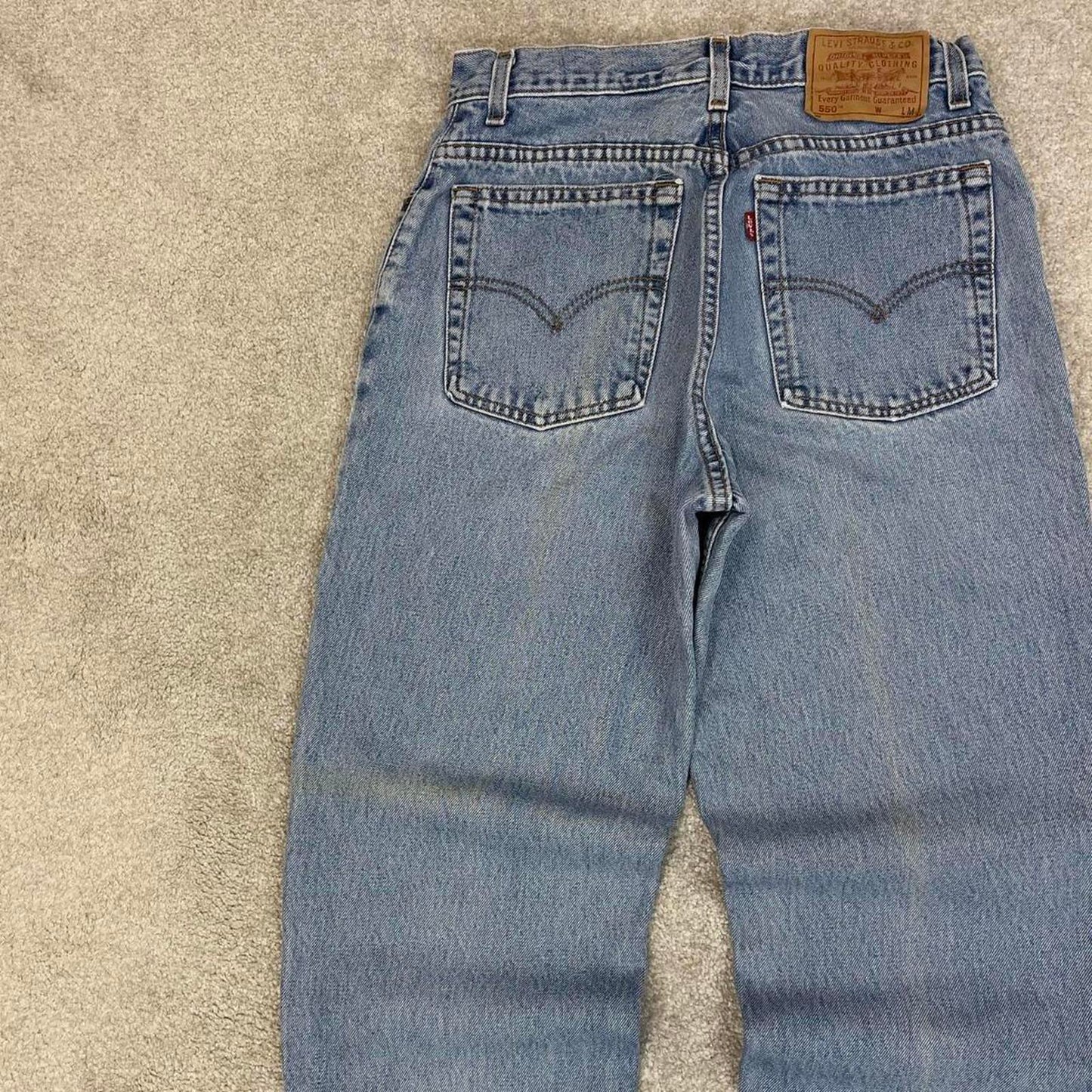 Blue Levis 550 jeans size size 10 W29L32 women's y2k 90s style tapered leg relaxed fit