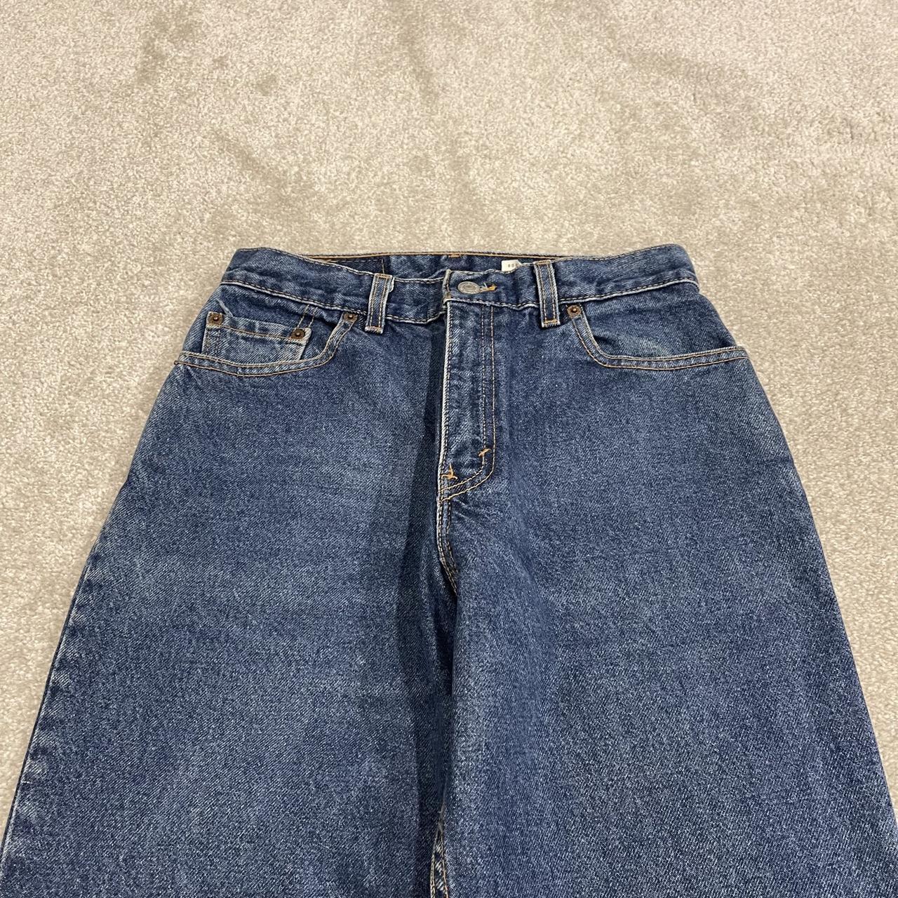 Y2K vintage Levi’s 550 jeans W26L31 blue Relaxed fit tapered leg 5 pocket pants red tab logo