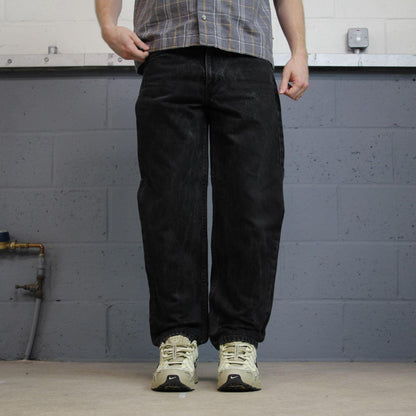 Black Levi’s 550 jeans Y2K denim Levi’s straight leg 2000s style pants red tab logo