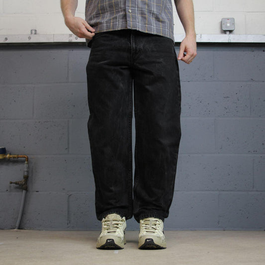 Black Levi’s 550 jeans Y2K denim Levi’s straight leg 2000s style pants red tab logo