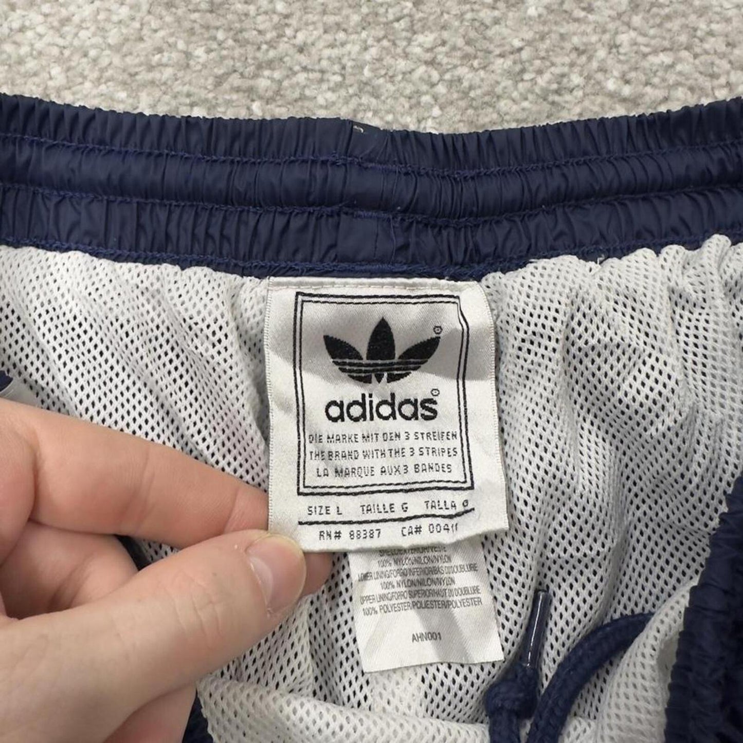 Adidas tracksuit bottoms loose leg navy Vintage mesh lined embroidered side stripe track pants
