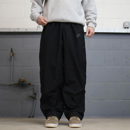 Baggy Nike Trackies L Black y2k 00s style wide leg joggers swoosh logo mesh lining