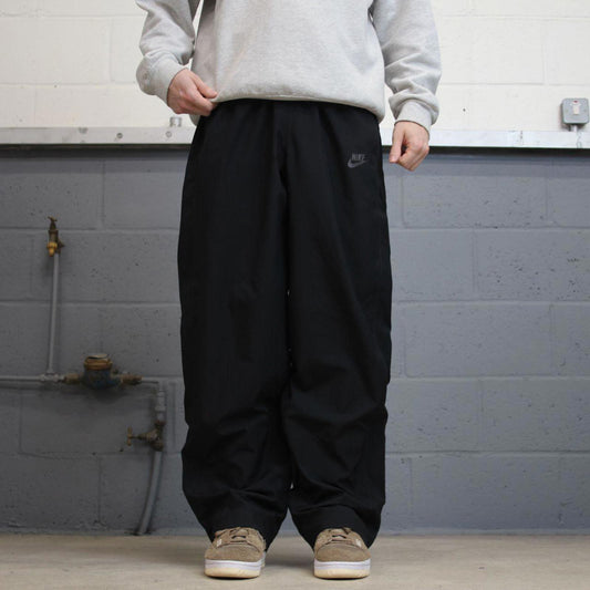 Baggy Nike Trackies L Black y2k 00s style wide leg joggers swoosh logo mesh lining
