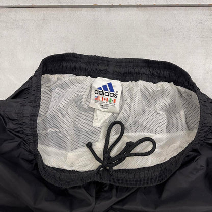 Baggy Adidas Trackies L black y2k 00s style loose mesh lined wide leg joggers embroidered logo