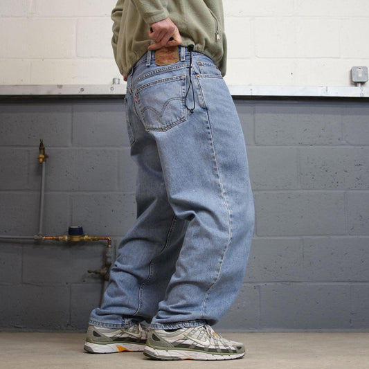 Y2K baggy Levi’s 560 jeans wide leg blue Loose comfort fit denim pants red tab logo