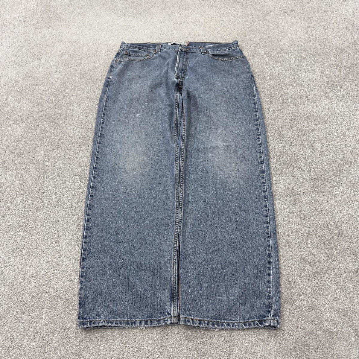 Levi’s 550 jeans Y2K blue relaxed denim Levi’s loose leg 2000s style pants red tab logo