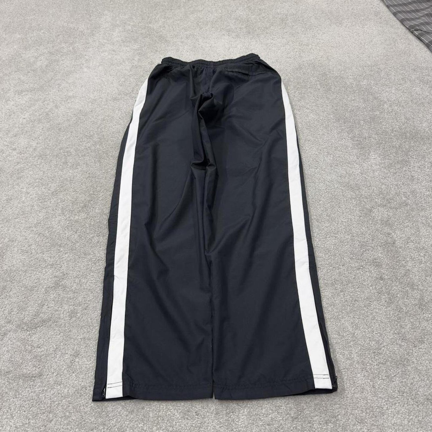 Nike tracksuit bottoms Y2K black Loose fit mesh lined embroidered side stripe track pants