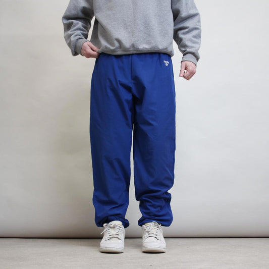 Blue vintage Reebok tracksuit bottoms L