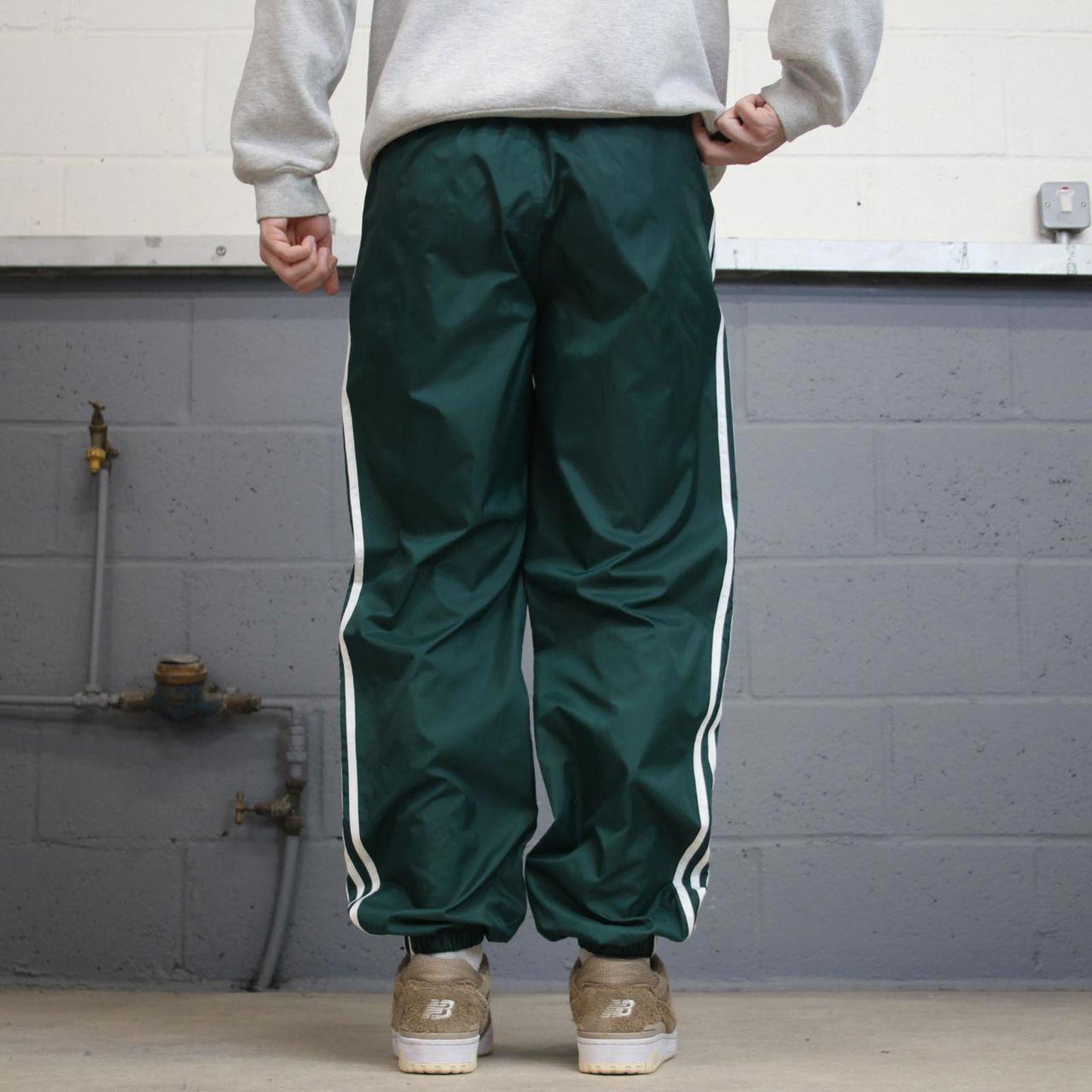 Green Adidas Team trackies M y2k style sportswear track pants embroidered logo side stripe design