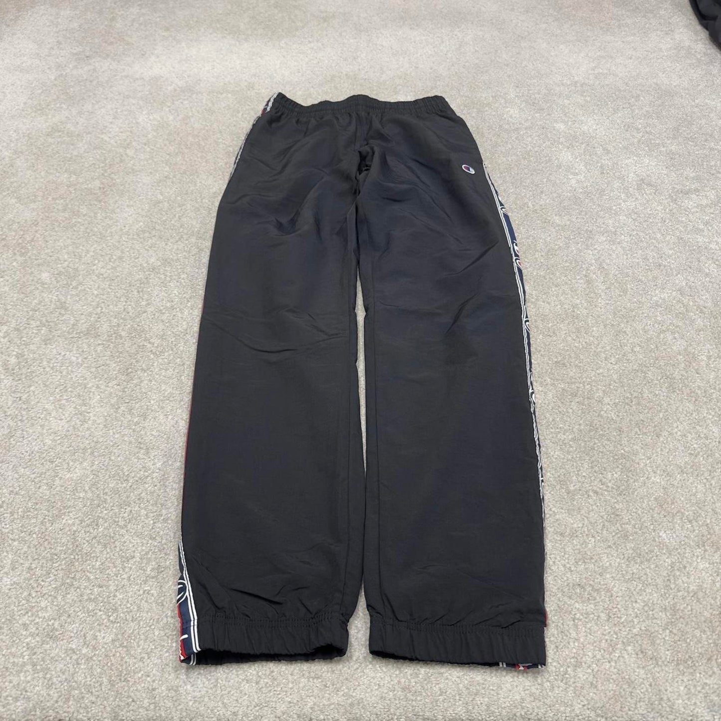 Vintage Champion tracksuit bottoms y2k style black joggers embroidered side stripe track pants