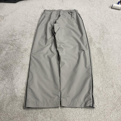 Vintage Nike baggy tracksuit bottoms Y2K grey Wide leg lined embroidered side stripe track pants