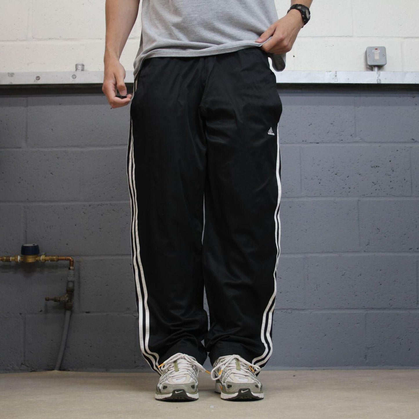 Adidas tracksuit bottoms loose black Loose floaty leg embroidered side stripe track pants