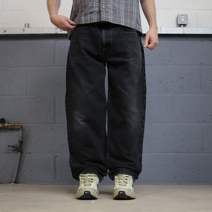 Levi’s 550 jeans y2k black denim Levi’s loose straight leg red tab logo pants