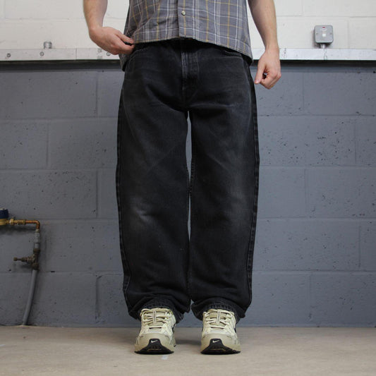 Levi’s 550 jeans y2k black denim Levi’s loose straight leg red tab logo pants