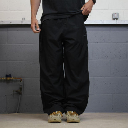 Reebok baggy tracksuit bottoms loose black Mesh lined embroidered drawstring track pants