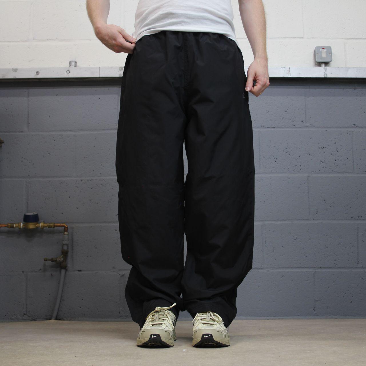 Champion baggy tracksuit bottoms wide leg black Mesh lined embroidered logo gym wear track pants