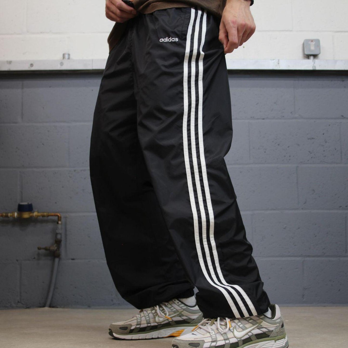 Adidas tracksuit bottoms loose black Loose floaty leg embroidered side stripe track pants