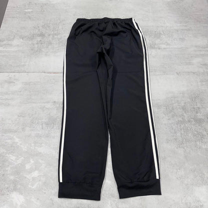Adidas Trackies L black y2k track bottoms embroidered logo side stripe design