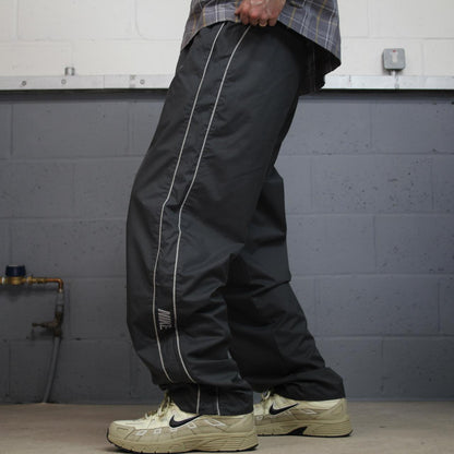 Vintage Nike baggy tracksuit bottoms Y2K grey Wide leg lined embroidered side stripe track pants