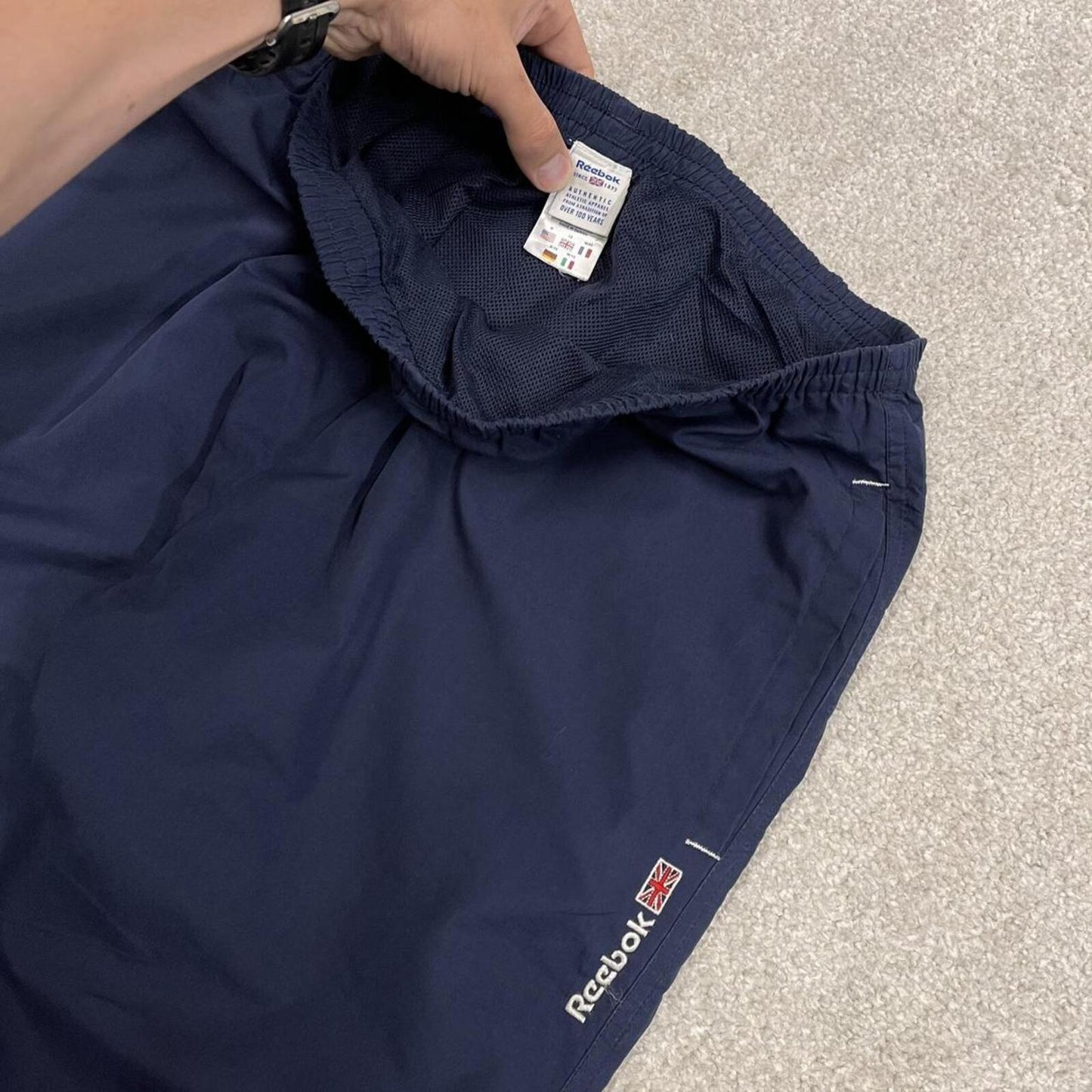 Vintage Reebok tracksuit bottoms loose navy Floaty embroidered mesh lined track pants