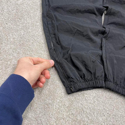 Vintage y2k FILA tracksuit bottoms black Loose floaty leg embroidered track pants ankle zips