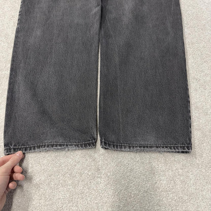 Levi’s 550 jeans Y2K relaxed fit denim faded black Levi’s loose leg 2000s style pants red tab logo