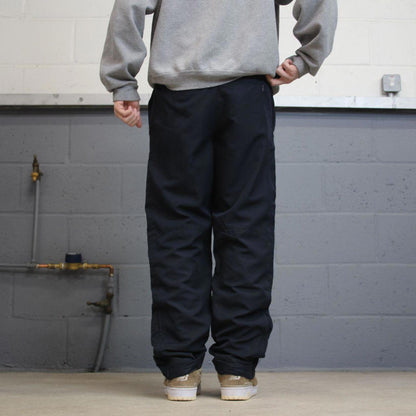 Vintage y2k loose Nike tracksuit bottoms navy black Lightweight mesh lined print logo track pants
