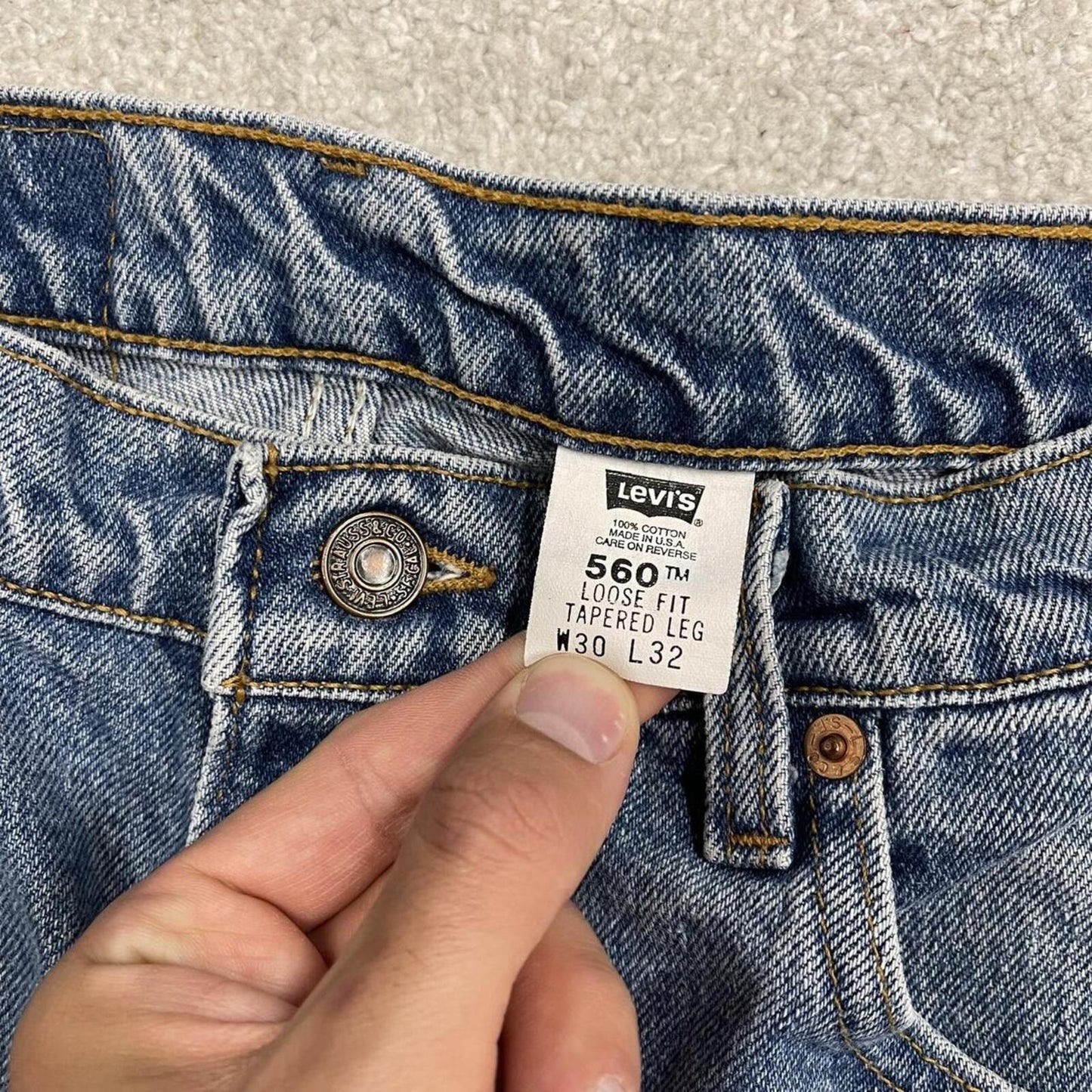 Vintage Levi's jeans 560 loose fit tapered leg blue USA made 100% cotton denim pants red tab logo