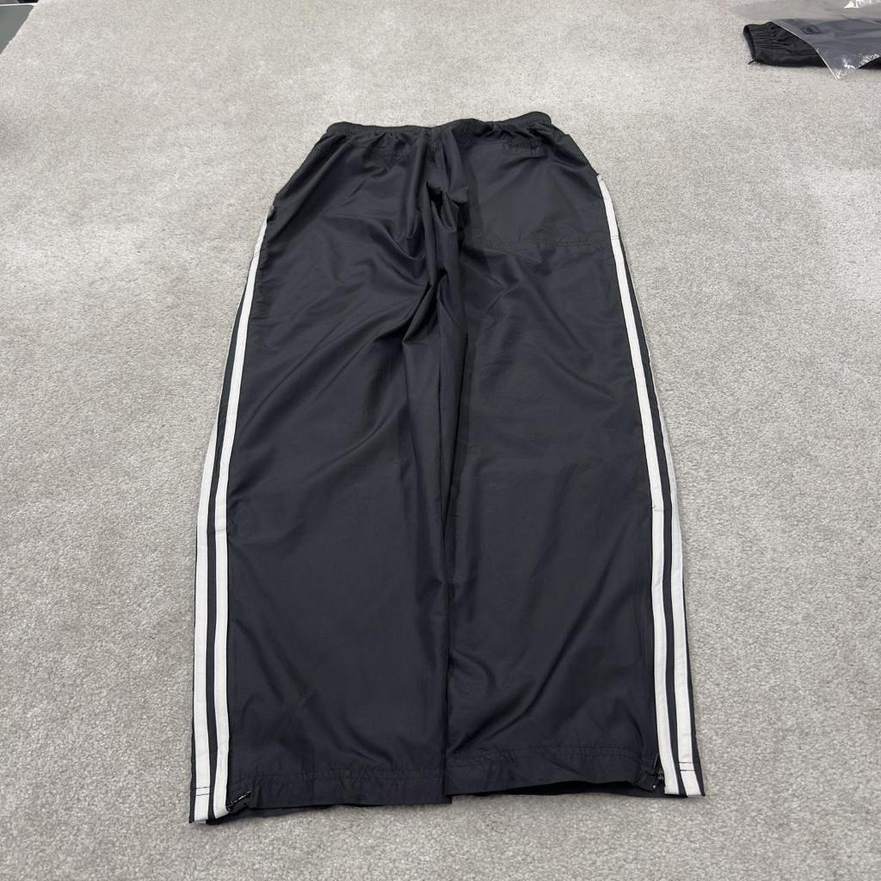 Vintage Adidas tracksuit bottoms loose black Loose floaty embroidered side stripe track pants