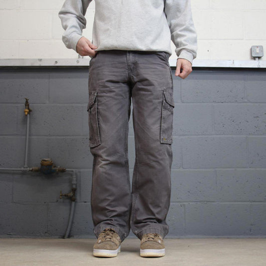 Grey Carhartt cargo pants W31L32 relaxed 90s style skater loose leg cargos patch logo