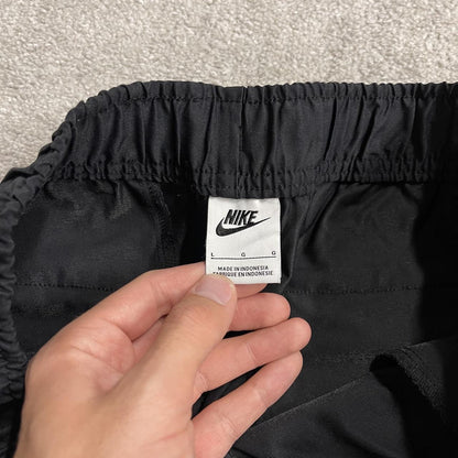Y2K Nike technical tracksuit bottoms black Ulined track pants with embroidered logo