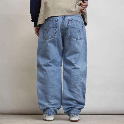 Levis jeans W38 L32 loose blue denim 90s style jeans red tab logo