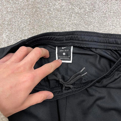 Vintage y2k Nike tracksuit bottoms black Lightweight swoosh logo running track pants