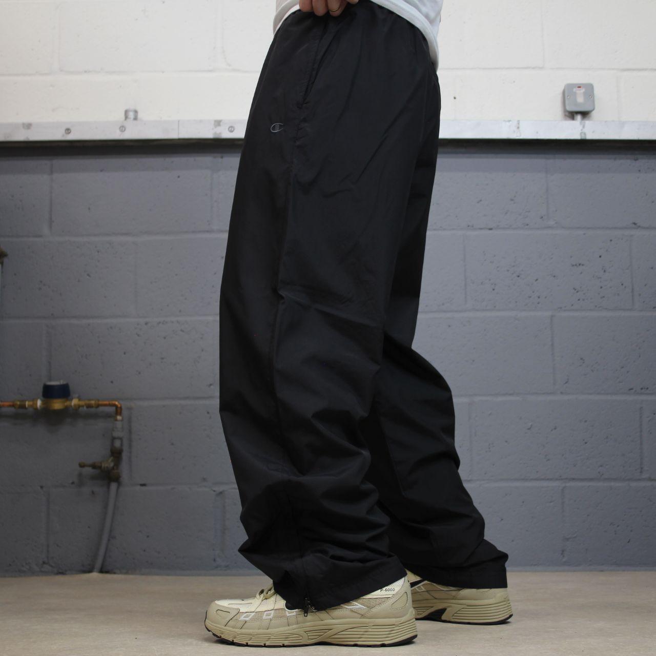 Champion baggy tracksuit bottoms wide leg black Mesh lined embroidered logo gym wear track pants