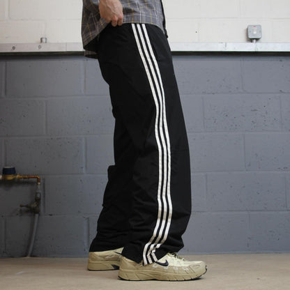 Y2K Adidas tracksuit bottoms loose leg black M Loose lined side stripe embroidered logo track pants