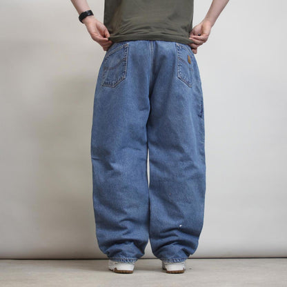 Mens Carhartt jeans W42 L30 Loose Blue fleece lined denim skate jeans patch logo