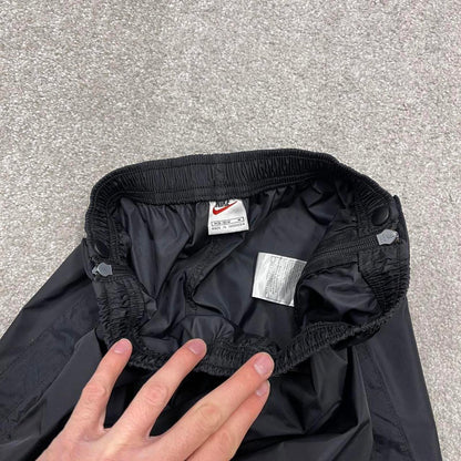 Vintage y2k baggy Nike tracksuit bottoms black Wide leg swoosh logo elasticated track pants