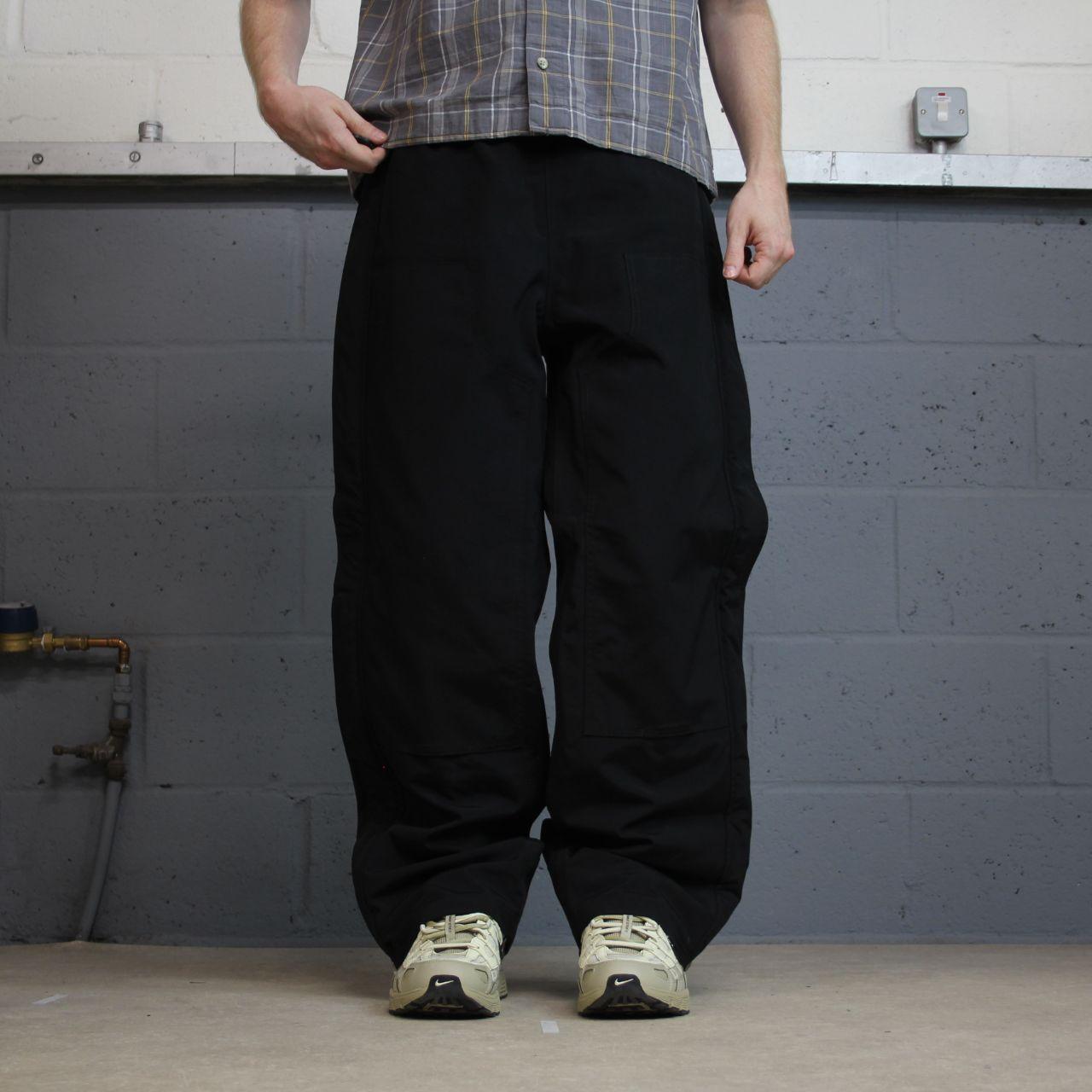 Carhartt baggy waterproof trousers wide leg black rain pants hiking snow pants outdoors technical