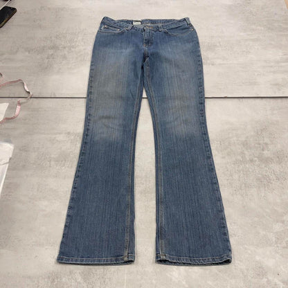 Blue Carhartt jeans size 12 (W34) traditional fit bootcut denim jeans patch logo