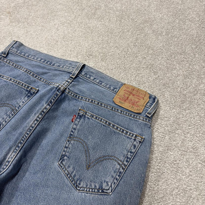 Levi’s baggy jeans y2k W36L34 blue 560 comfort fit surf style pants red tab logo
